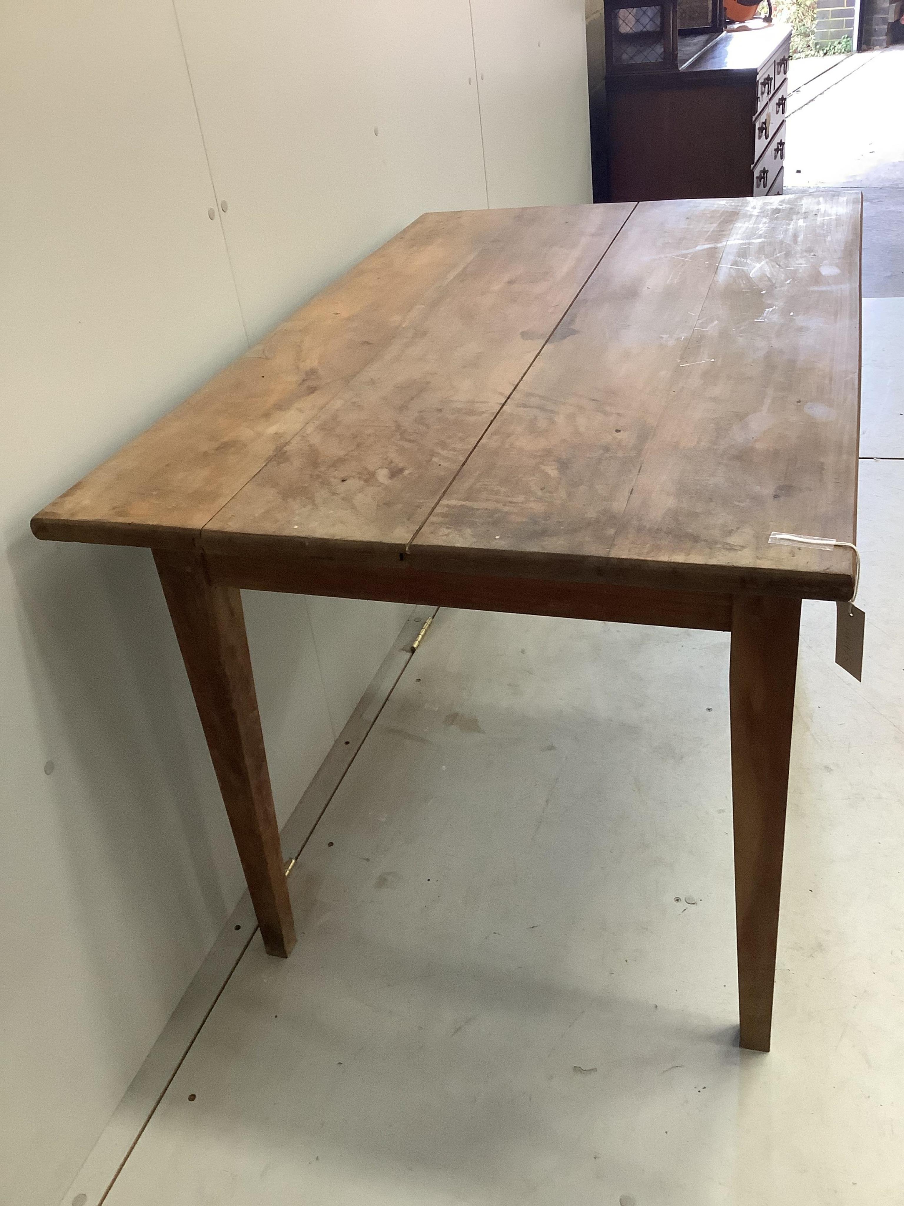 A 19th century French rectangular cherry kitchen table, width 121cm, depth 77cm, height 75cm. Condition - fair